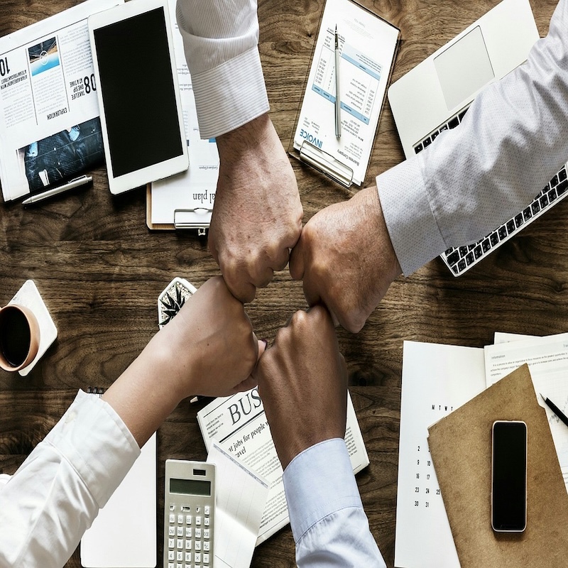 Work team that join the hands together