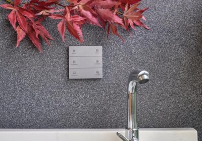 Dimi waterproof wireless switch with engraving installed in the bathroom wall next to the water sink