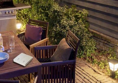Dimi wireless and waterproof switch used in outdoor landscape during barbecue which the property owner using from table top