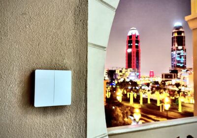 A Dimi switch installed outdoor in a luxury residential complex with view of the city in the night