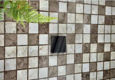 A waterproof keypad installed in a bath with slash of water - Smart Control Set Free